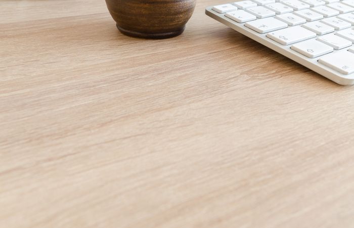 Keyboard And Cup Of Coffee On Desk Photo