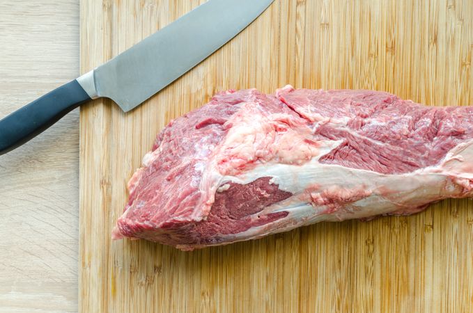 Knife Near Meat Photo
