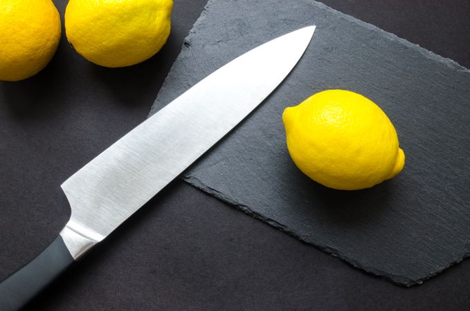 Lemon Near Kitchen Knife Photo