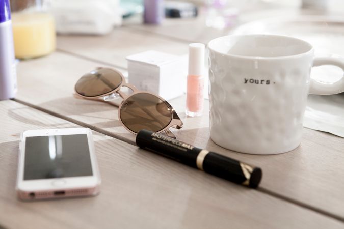 Makeup Accessories On Wooden Table Photo