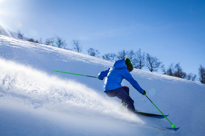 Man Performing Stunt During Snow Surfing Photo