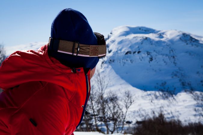 Man Performing Stunt During Snow Surfing Photo
