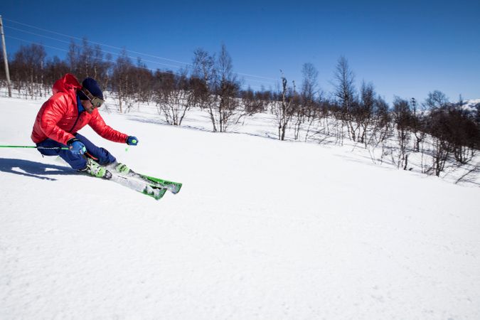 Man Skiing On Snow Covered Mountain Photo