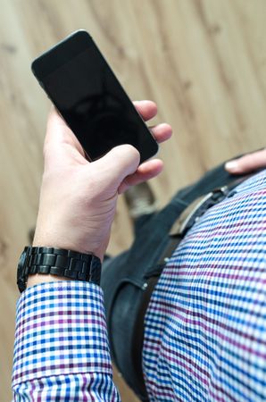 Man Using His Phone Photo