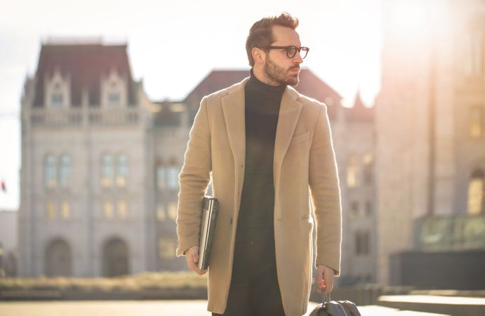 Man Wearing Brown Coat Photo