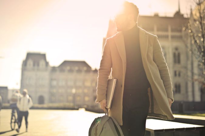 Man Wearing Brown Coat Photo