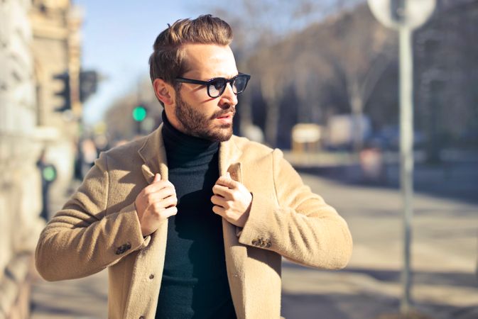 Man Wearing Eyeglasses And Brown Jacket Photo