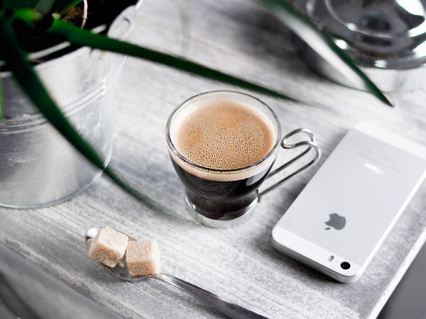 Morning Tea And Smartphone On Breakfast Table Photo