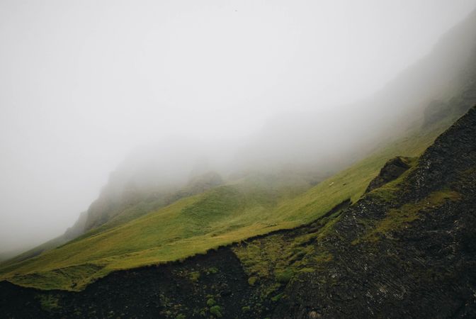 Mountain Covered By Clouds Photo