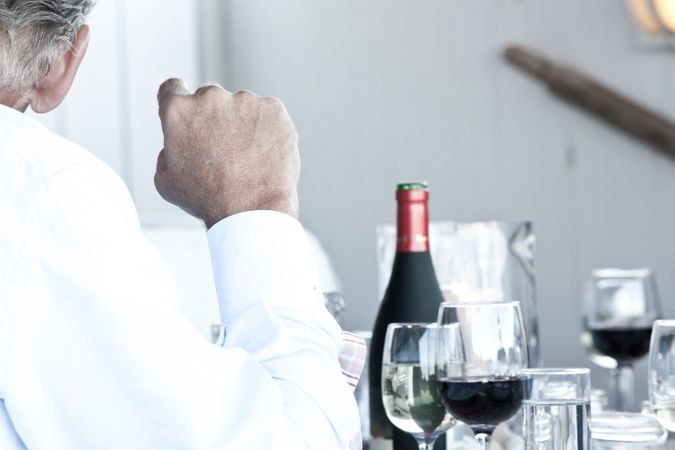 Old Man Celebrating Wedding With Alcohol Photo