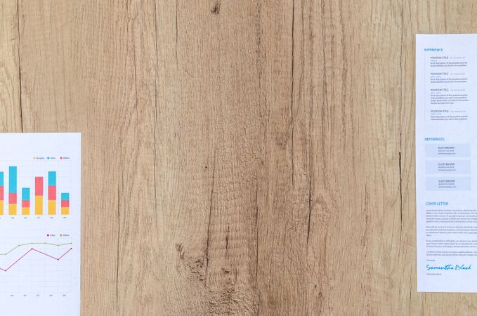 Papers On Wooden Table Photo