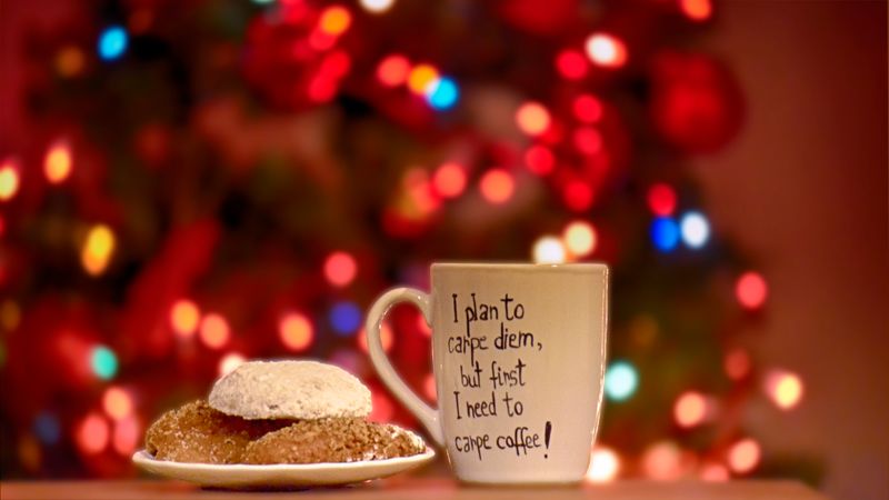 Pastry Beside Ceramic Mug On Christmas Evening Photo
