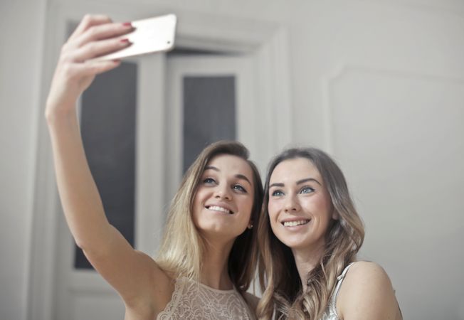 Photo Of Women Taking Picture Photo
