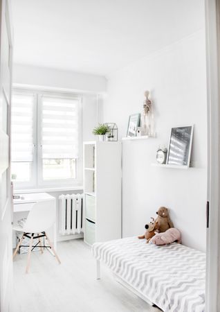 Plush Toys On Top Of White And Grey Mattress Inside Bedroom Photo