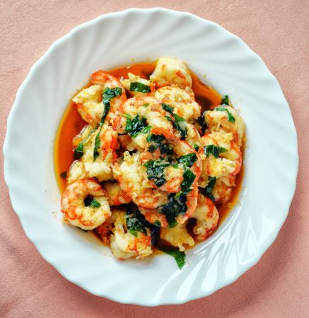 Prawn In Plate With Souses And Basil Leaves Photo