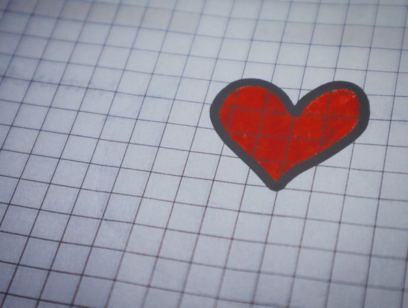 Red Heart Drawn On Graph Paper Photo