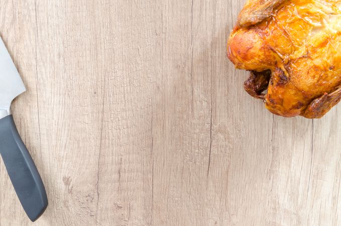 Roasted Chicken On Wooden Table Photo