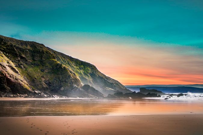 Scenic View Of Beach During Dawn Photo