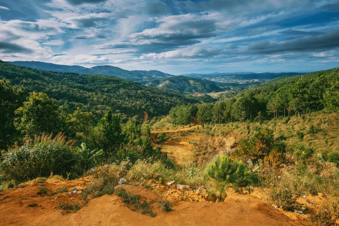Scenic View Of Mountains Under Cloudy Sky Photo