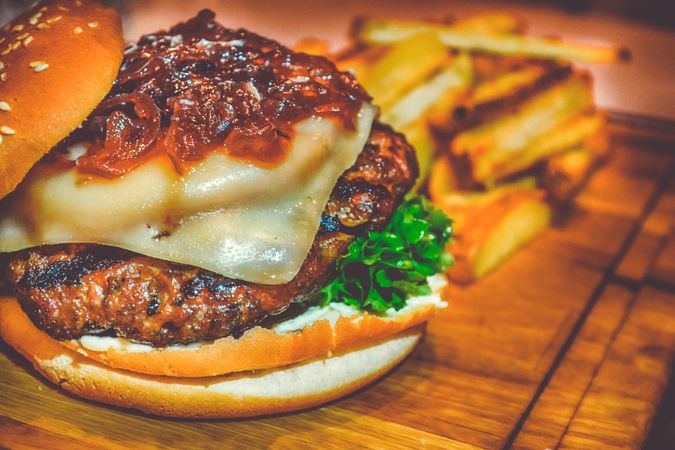 Selective Focus Of Ham Burger On Wooden Surface Photo Photo