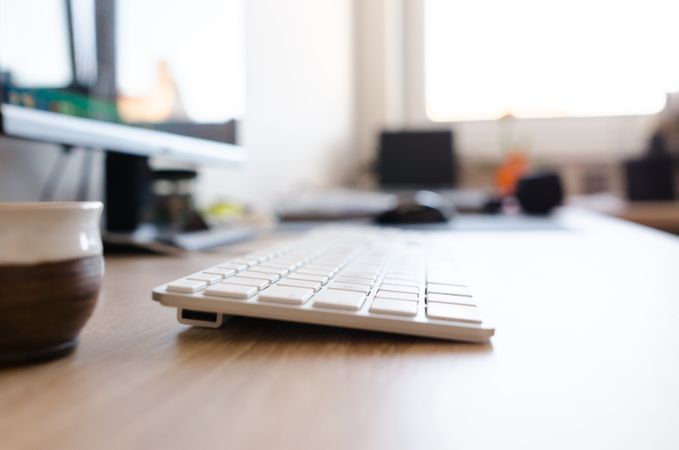 Side View Of White Keyboard Photo
