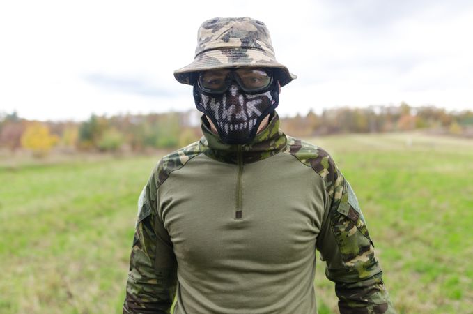 Soldier Covered His Face By Mask Photo