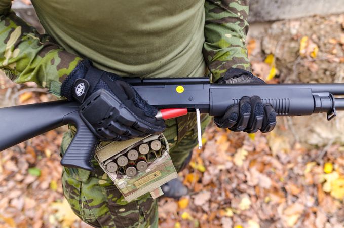 Soldiers Holdings Gun Photo