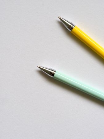 Teal And Yellow Point Pens Photo