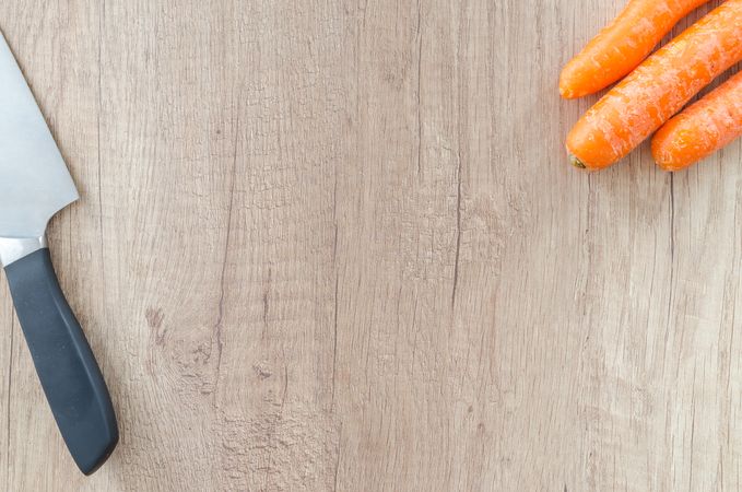 Three Carrot's With Knife Photo