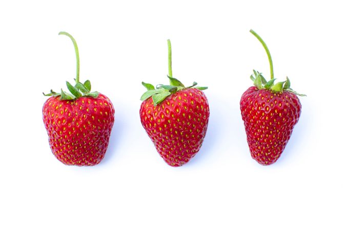 Three Delicious Fresh Strawberries Photo