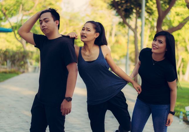Three Friends Enjoying In Park Photo