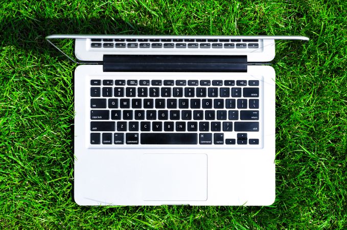 Top View Of Macbook In Lawn Photo
