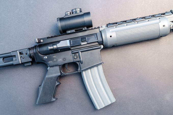 Top View Of Rifle On Gray Table Photo