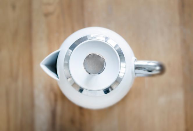 Top View Photo Of Kettle On Wooden Surface Photo