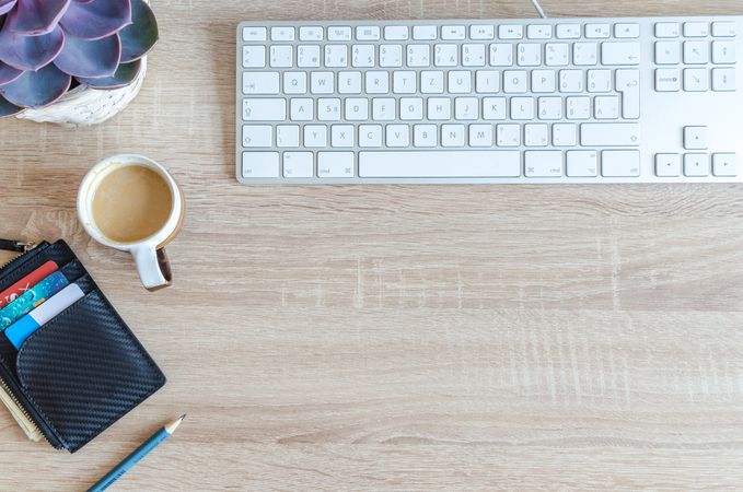 White Apple Keyboard Near White Cup Of Coffee Photo