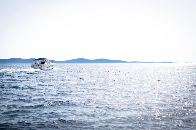White Boat On Clean Blue Water At Croatia Photo