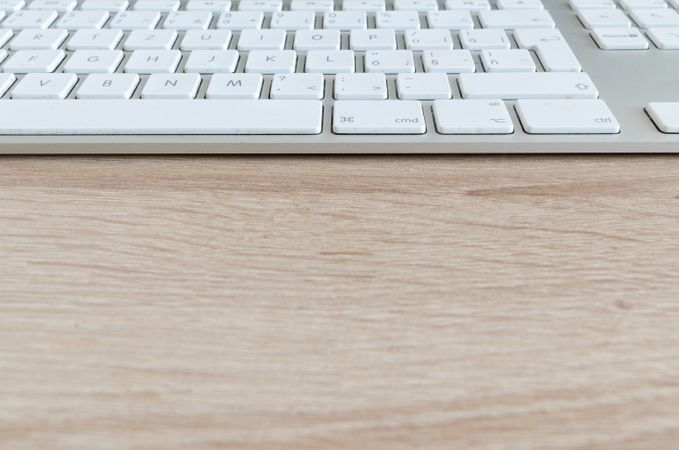 White Keyboard On Desk Photo