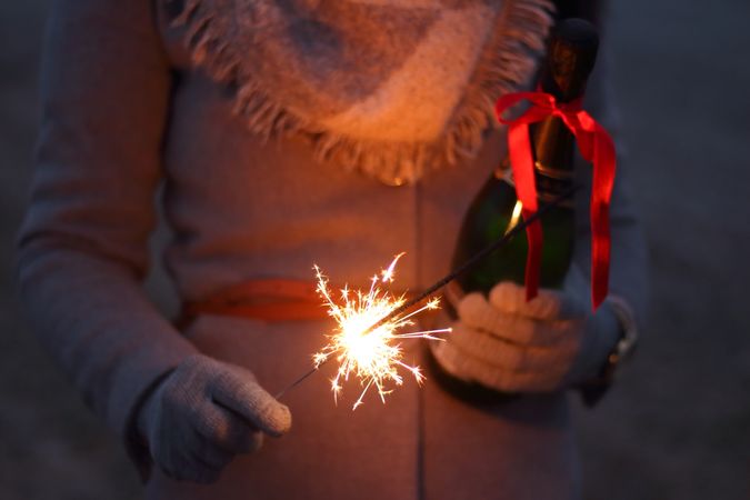 Woman Holding Burnt Sparkler Photo