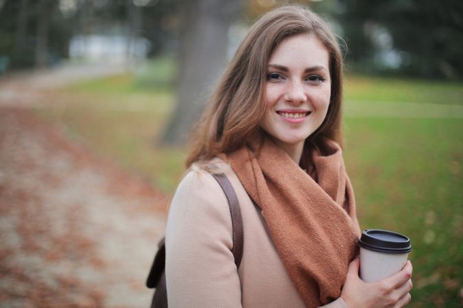 Woman Holding Disposable Cup Photo