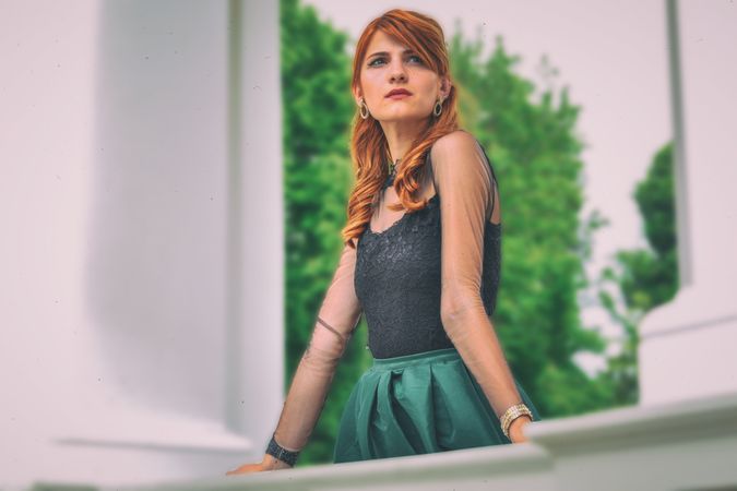 Woman In Black Top With Green Skirt Photo