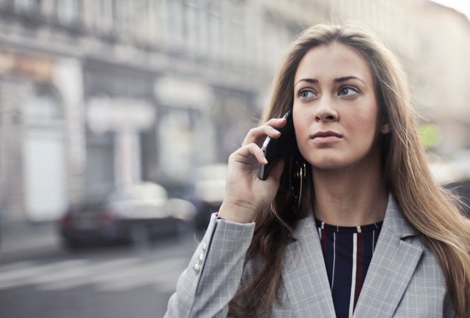 Woman In Grey Notched Lapel Suit Photo