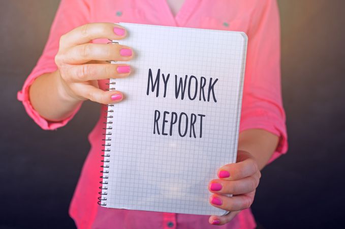 Woman In Pink Long-sleeved Shirt Holding White Book With My Work Report Text Print Photo