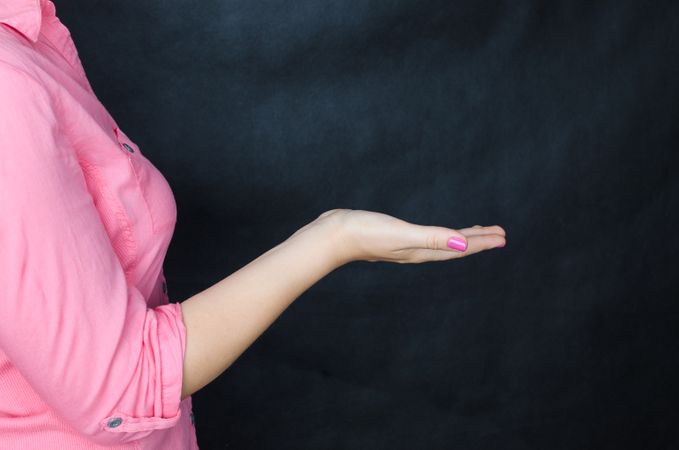 Woman In Pink Shirt Begging Something Photo