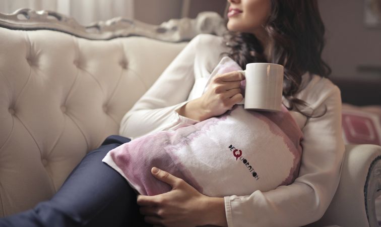 Woman In White Long-sleeved Shirt Holding White Ceramic Mug Photo