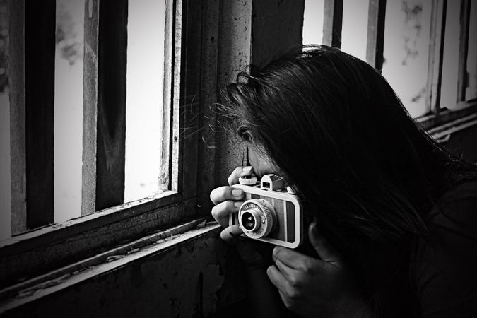 Woman Taking Photo From Camera Photo