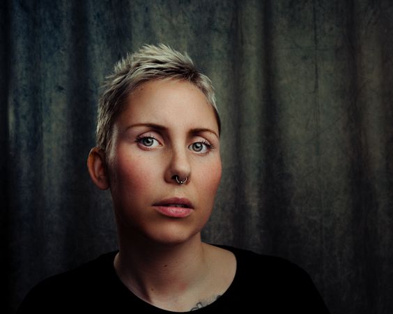 Woman With Silver-colored Septum Piercing Photo