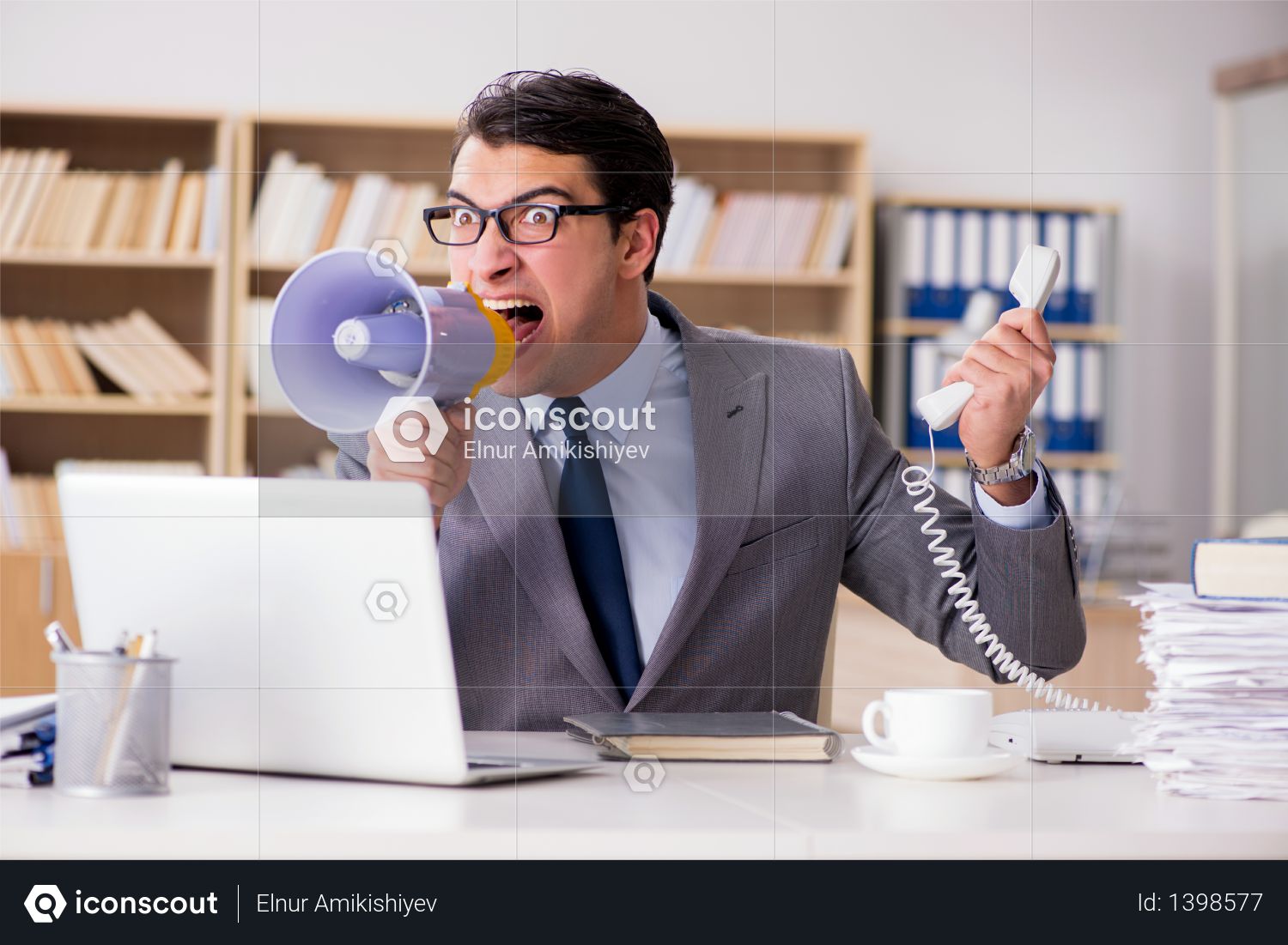 Angry businessman working in the office Photo