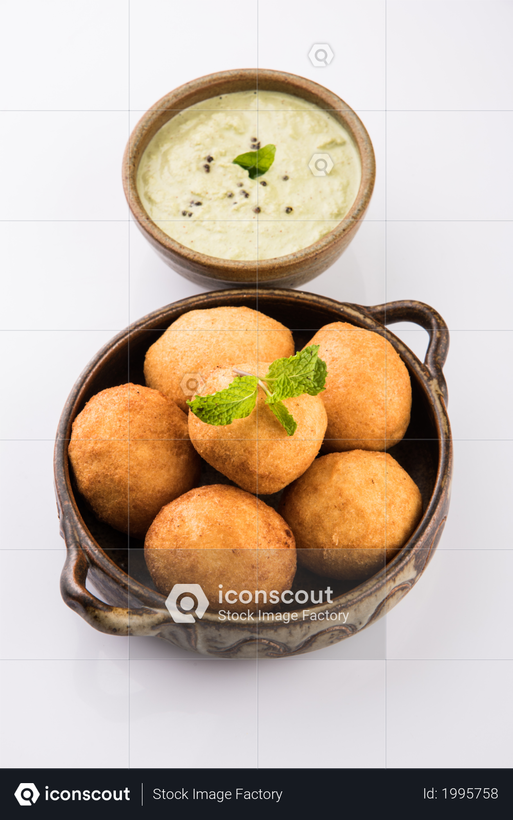 premium batata vada or aloo bonda is a tasty and popular indian tea time snack served with green chillies and tomato ketchup photo download in png jpg format premium batata vada or aloo bonda is a tasty and popular indian tea time snack served with green chillies and tomato ketchup photo download in png