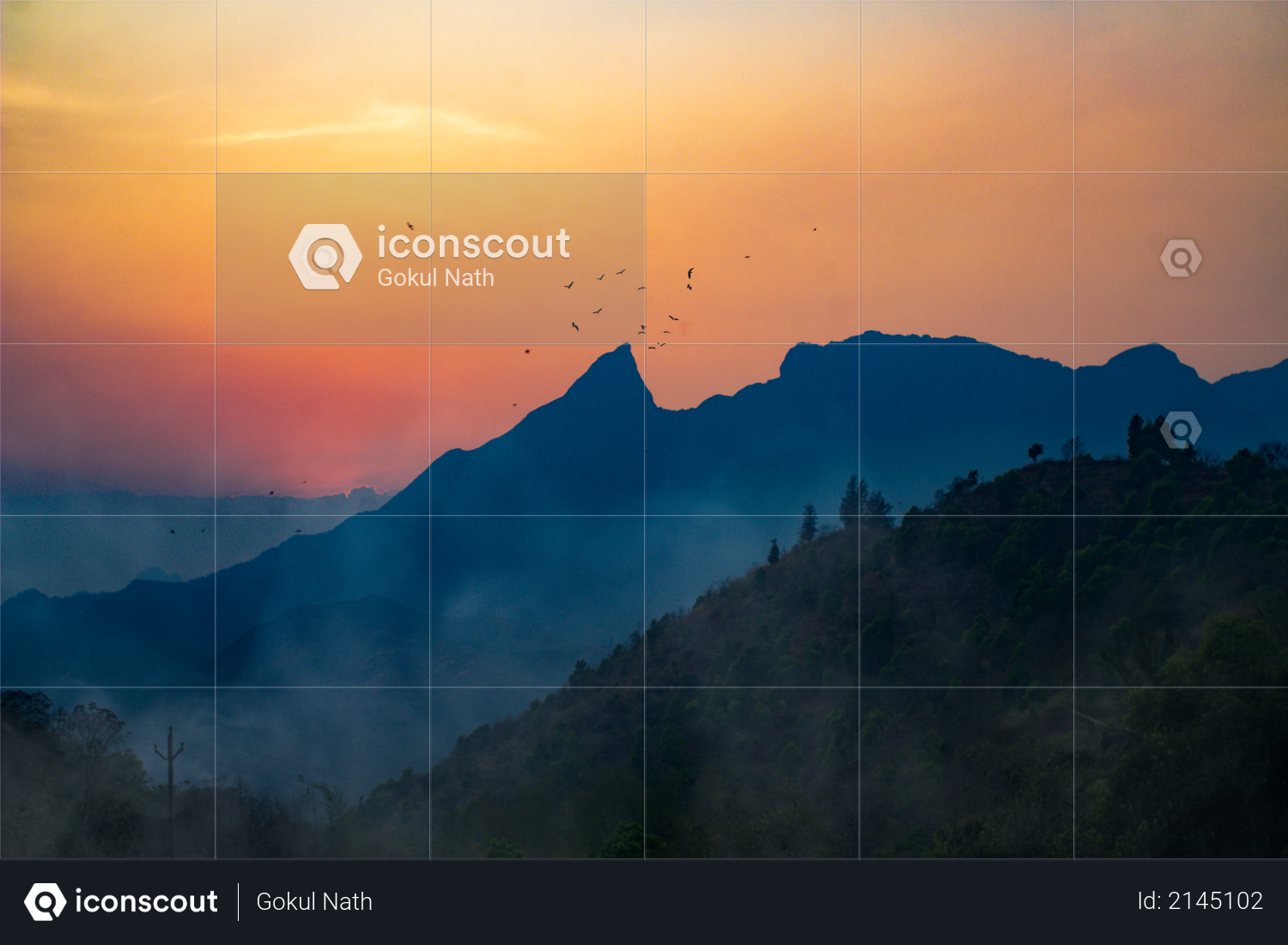 Beautiful sunset view behind the mountains Photo
