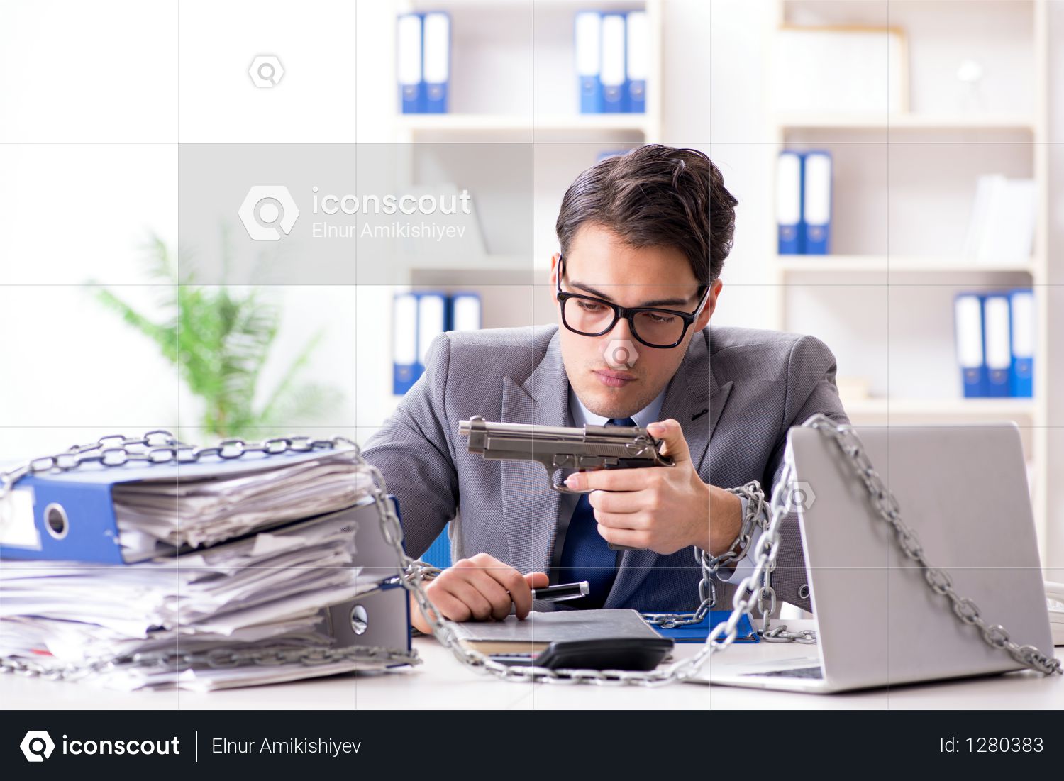 Premium Busy Employee Chained To His Office Desk Photo In Employee Chained To His Office Desk